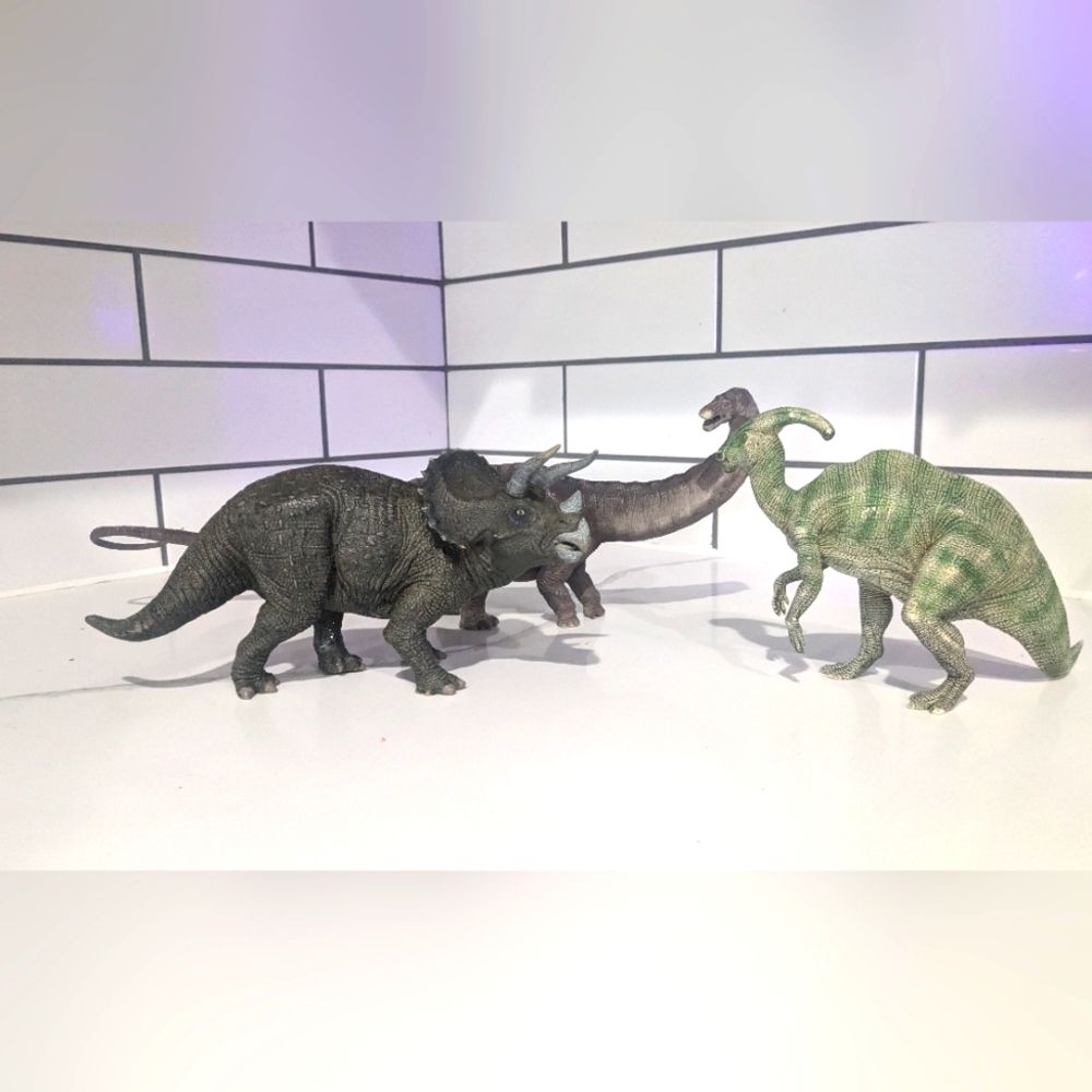 Three Papo dinosaur figurines